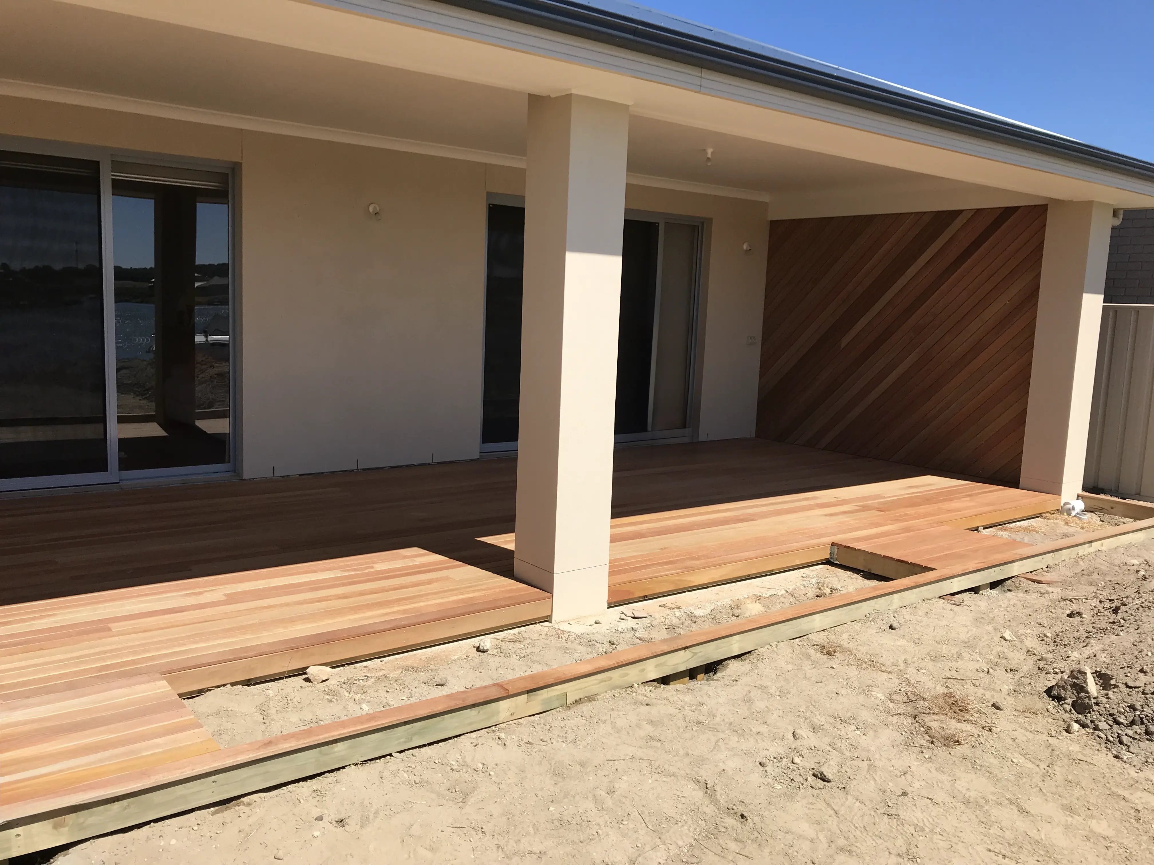New alfresco deck with feature angled timber wall